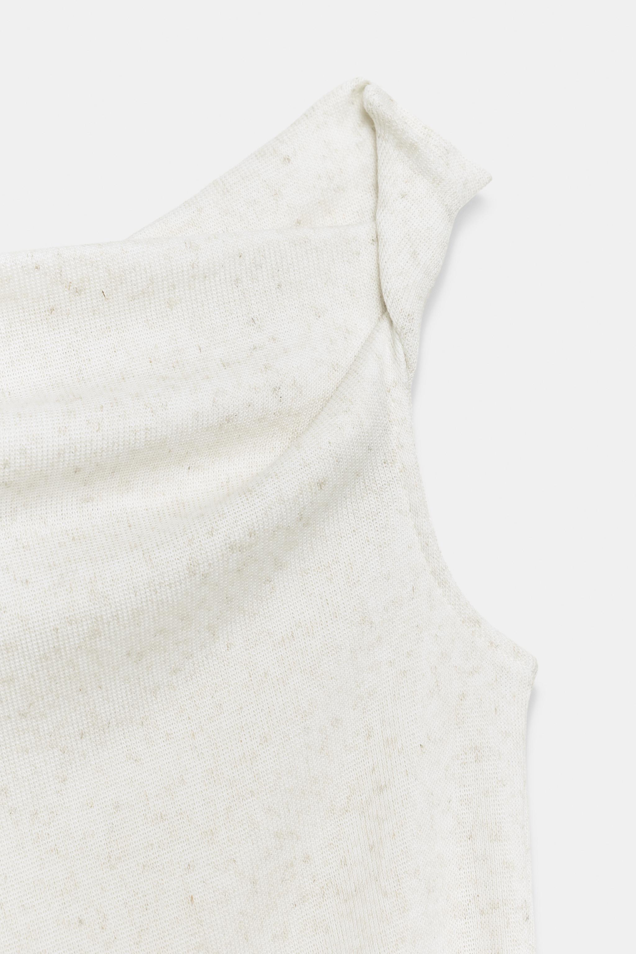 ASYMMETRIC RUSTIC TOP